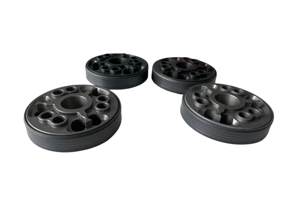 Finished pistons with PTFE film installed
